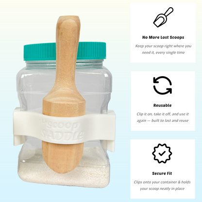 The Scoop Saddle clip shown on a Buff City Soap jar holding a wooden scoop, alongside icons highlighting key features: No More Lost Scoops, Reusable, and Secure Fit.